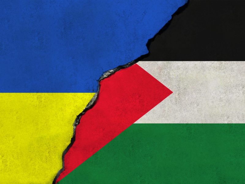 Ukraine and Palestine flag together via Getty Images