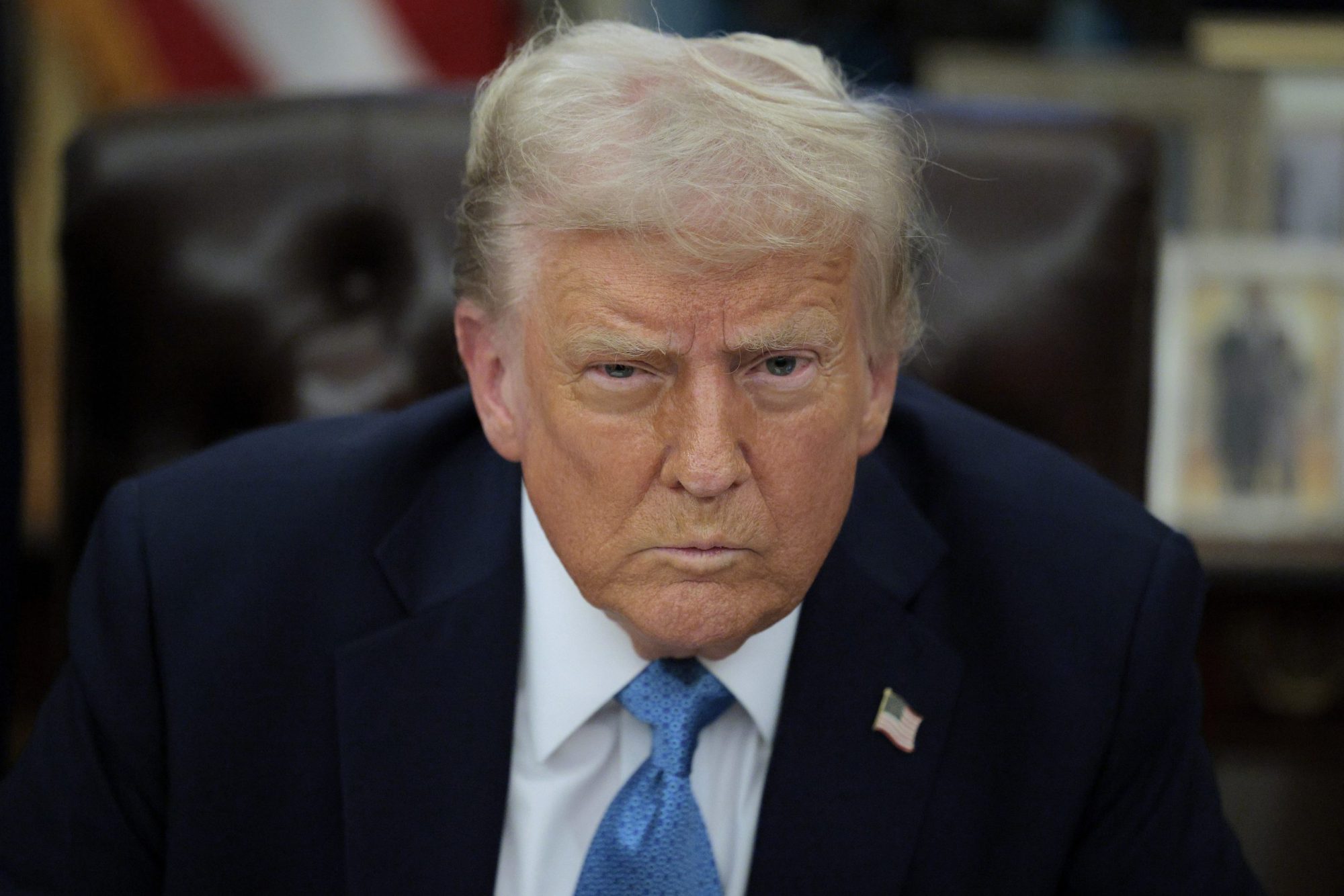 President Donald Trump talks to reporters after signing an executive order, "Unleashing prosperity through deregulation," in the Oval Office on January 31, 2025 in Washington, DC. Photo by Chip Somodevilla/Getty Images